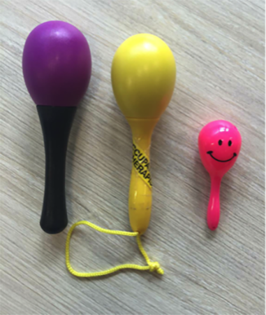 The Pink Rattle is much smaller and lighter than the other rattles pictured – leading to increased ease of use and a positive play experience for the very small infant.